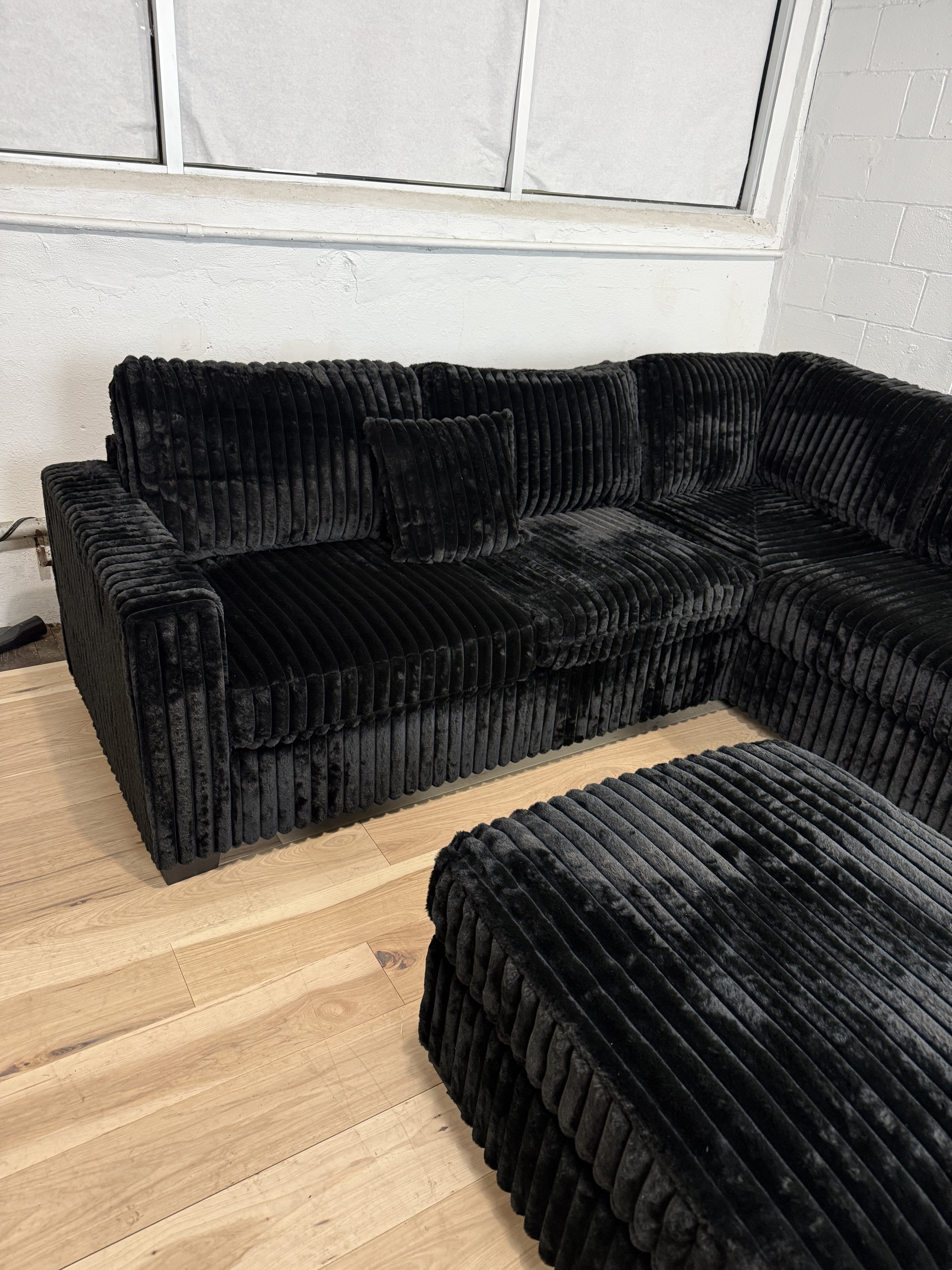 Plush Black Corduroy Sectional Sofa + Ottoman